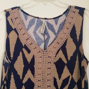 EUC L Sleeveless Top in Blue & Brown Ikat Pattern.